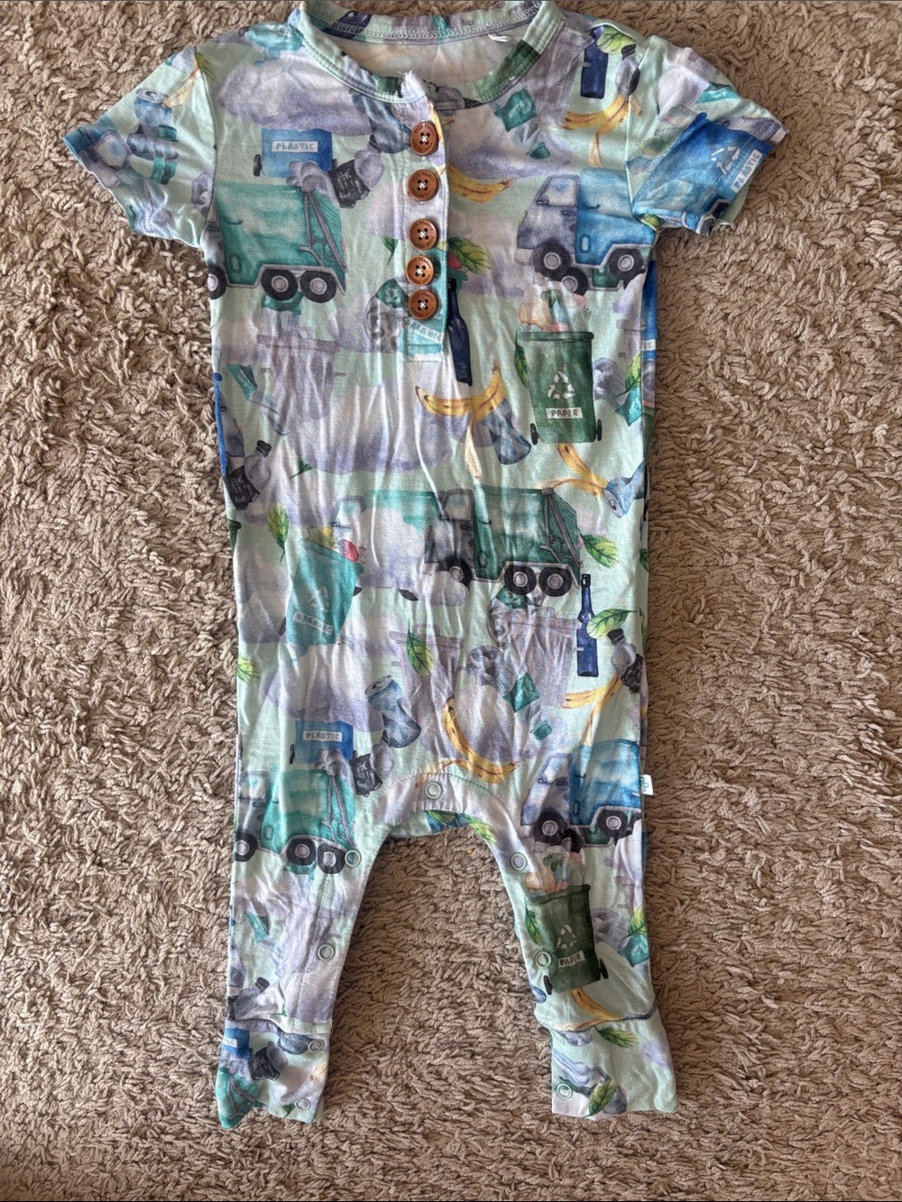 Posh Peanut Short-Sleeve Romper in Garbage Truck Print. Like New. Size 12-18 mos